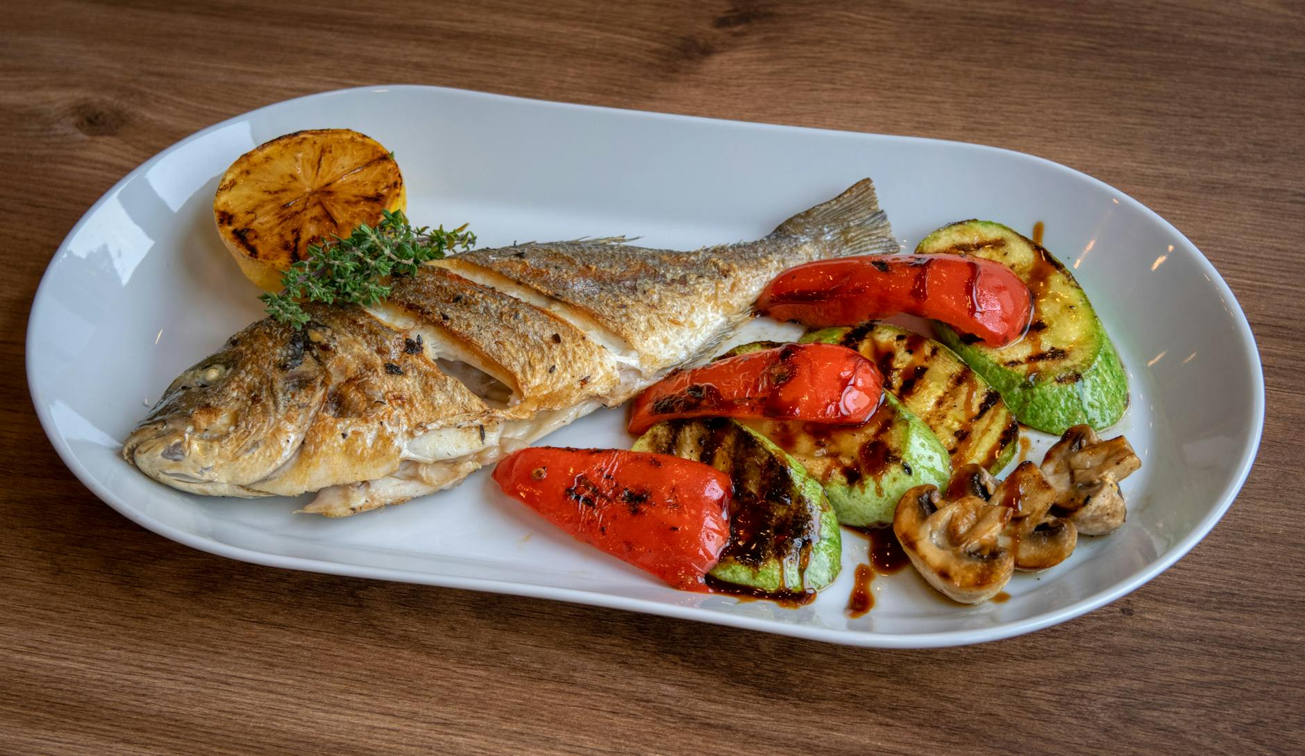 fried fish and grilled vegetables