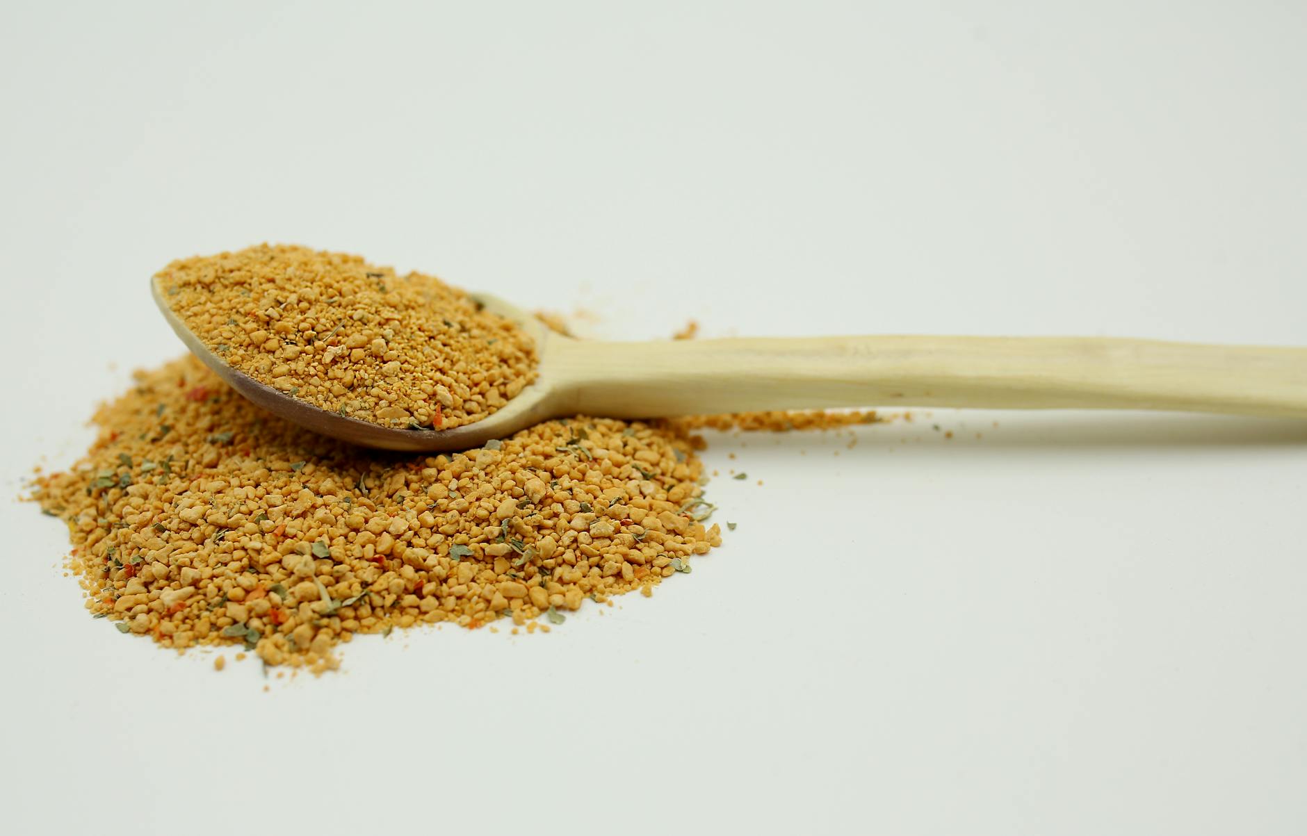 side view of a tablespoon of bee pollen