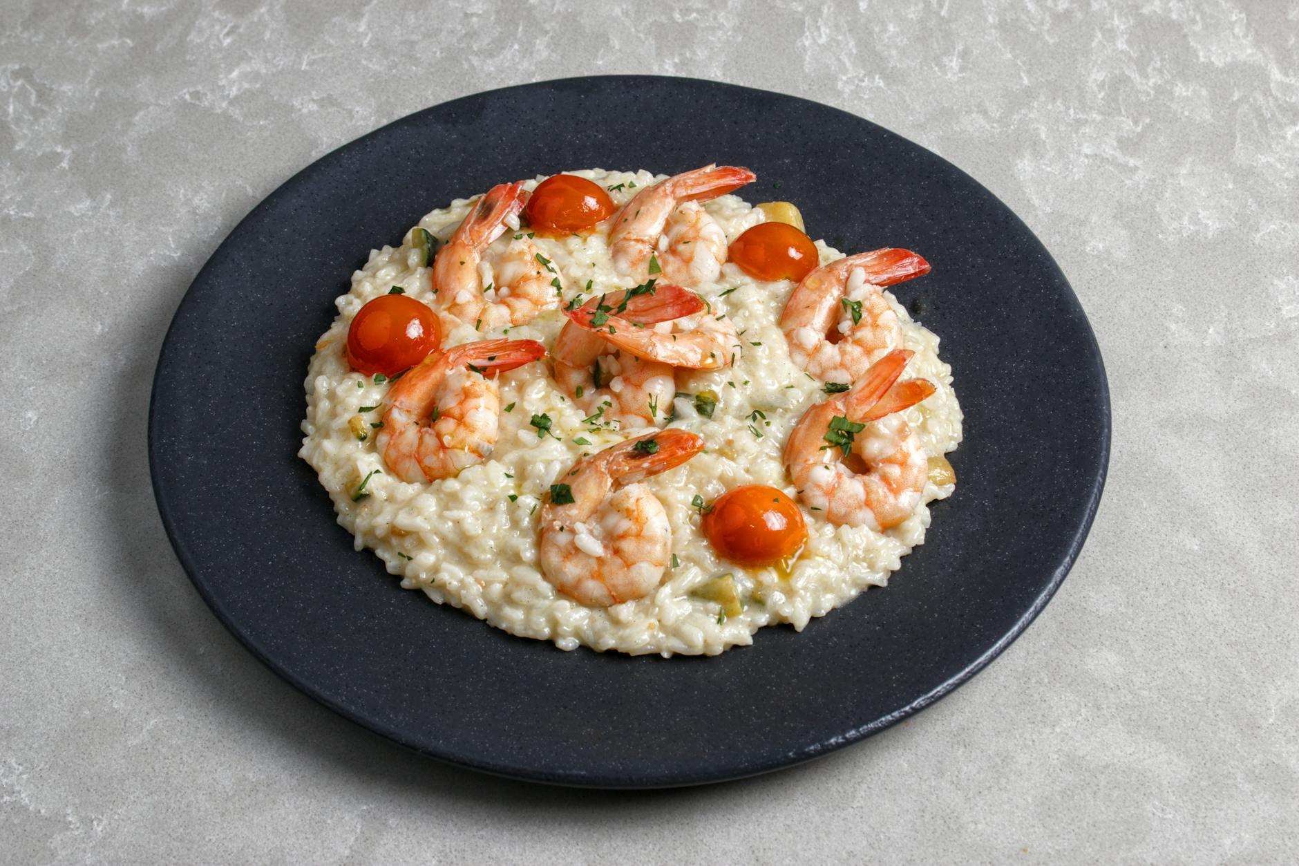 delicious shrimp risotto with cherry tomatoes