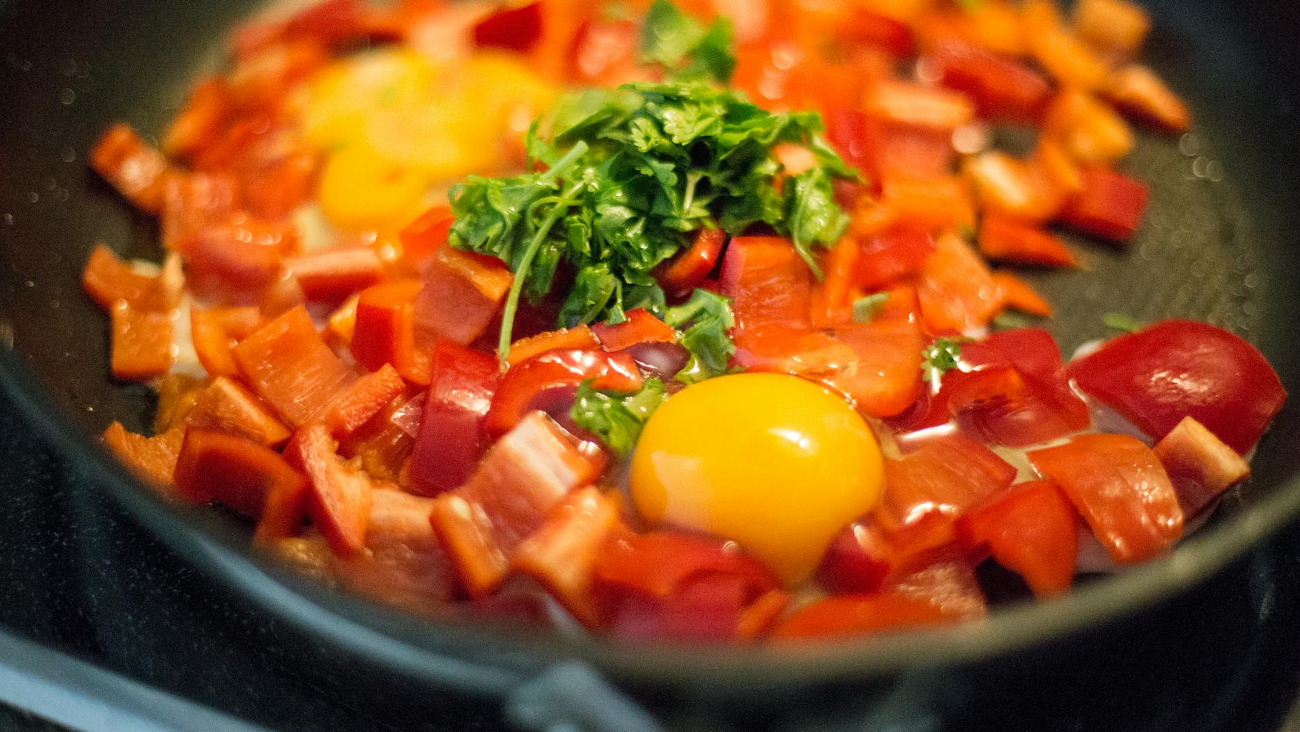 fried eggs with tomatoes