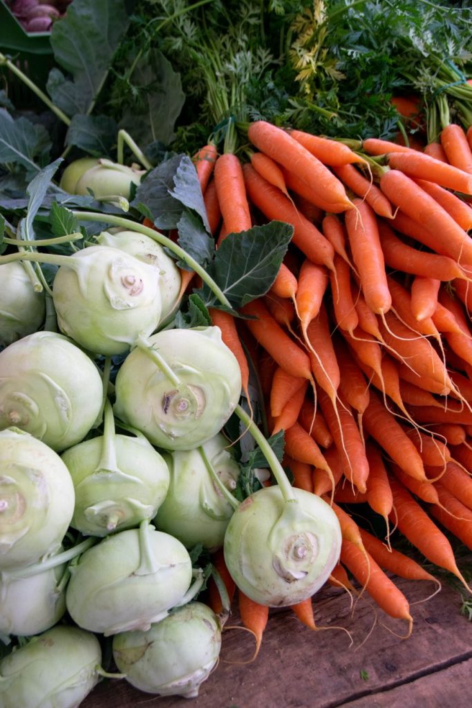 close up shot of beetroots and carrots
