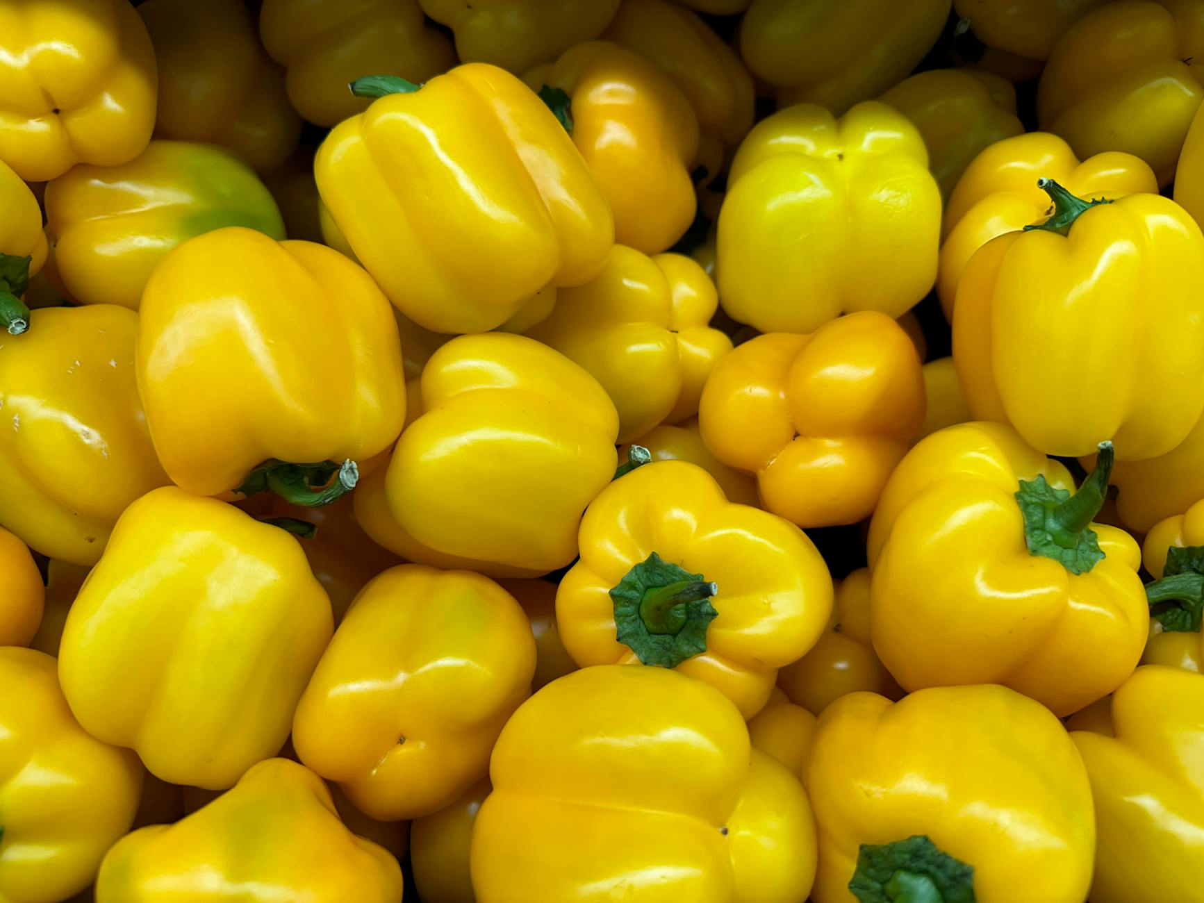 close up of yellow peppers