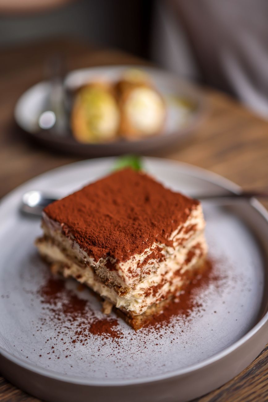 a piece of tiramisu on a plate