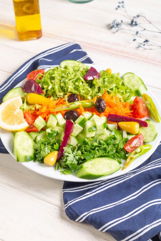 fresh mixed vegetable salad on plate