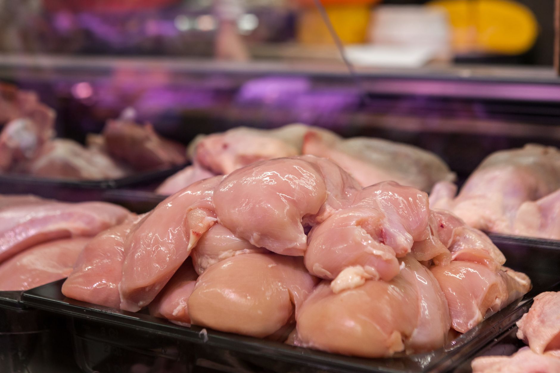 raw meat on display in supermarket
