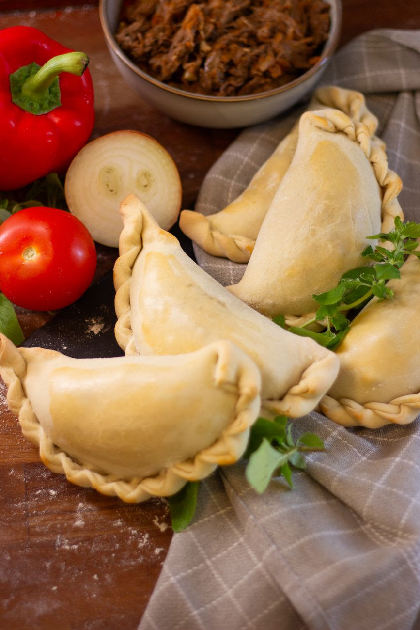 freshly baked empanadas with vegetables
