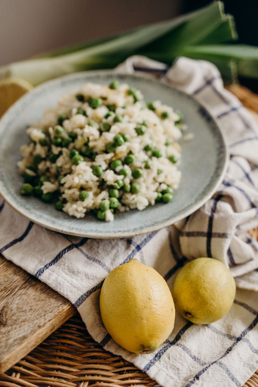 rice mixed with greenpeace on ceramic plate